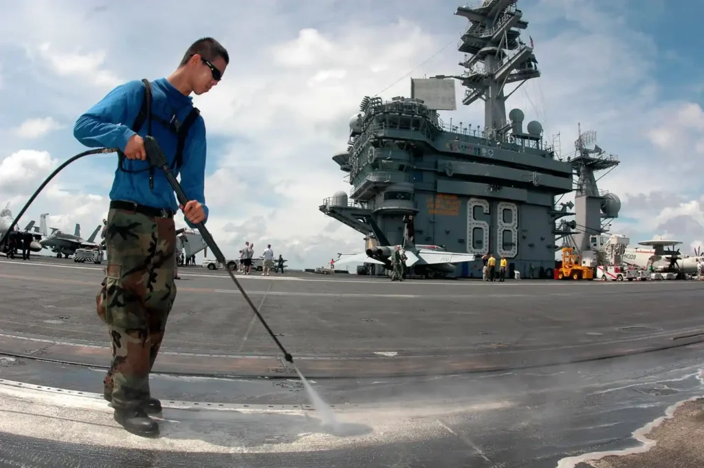 pressure washer to clean the flight deck