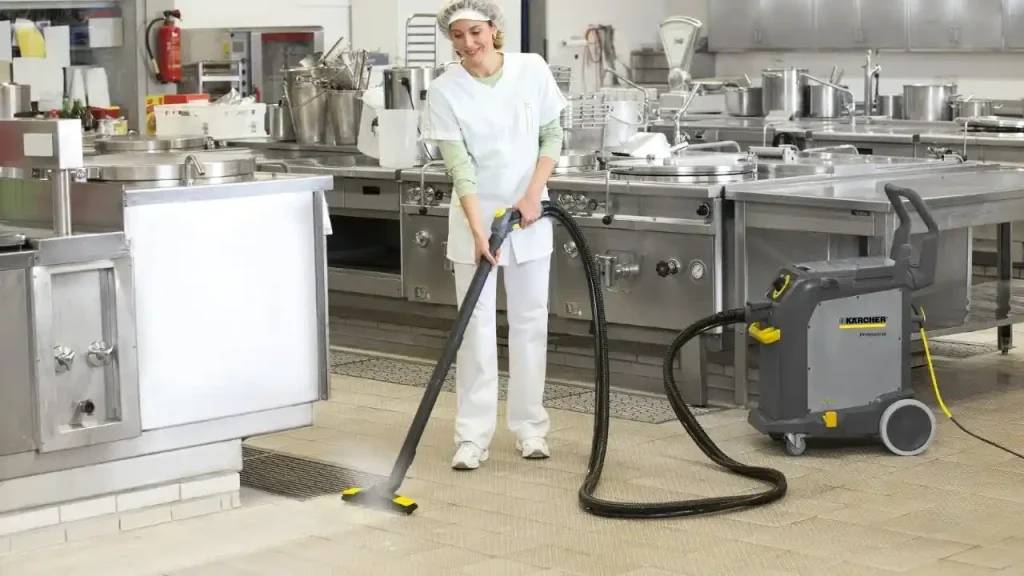 steam cleaner being using to clean resturant and commercial kitchen