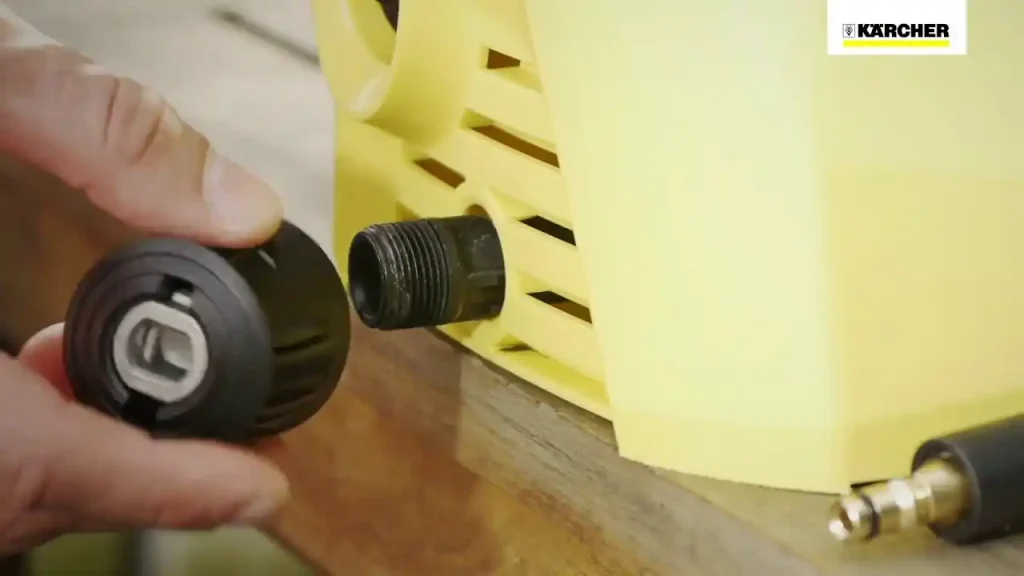 attaching hose kit to pressure washer
